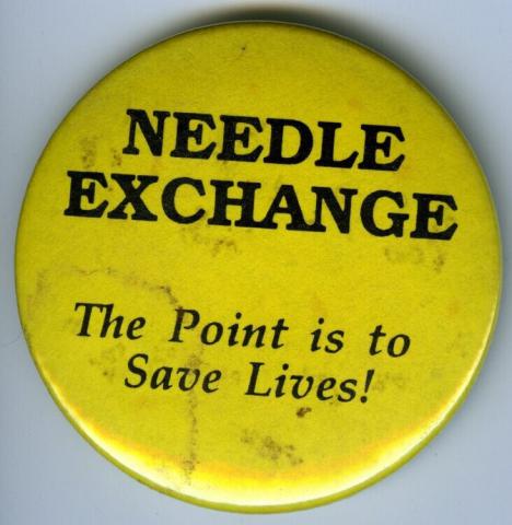 Pin that says "Needle Exchange: the Point is to Save Lives!"